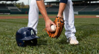 Mariners' Rodriguez leaves game after throw hits back of helmet